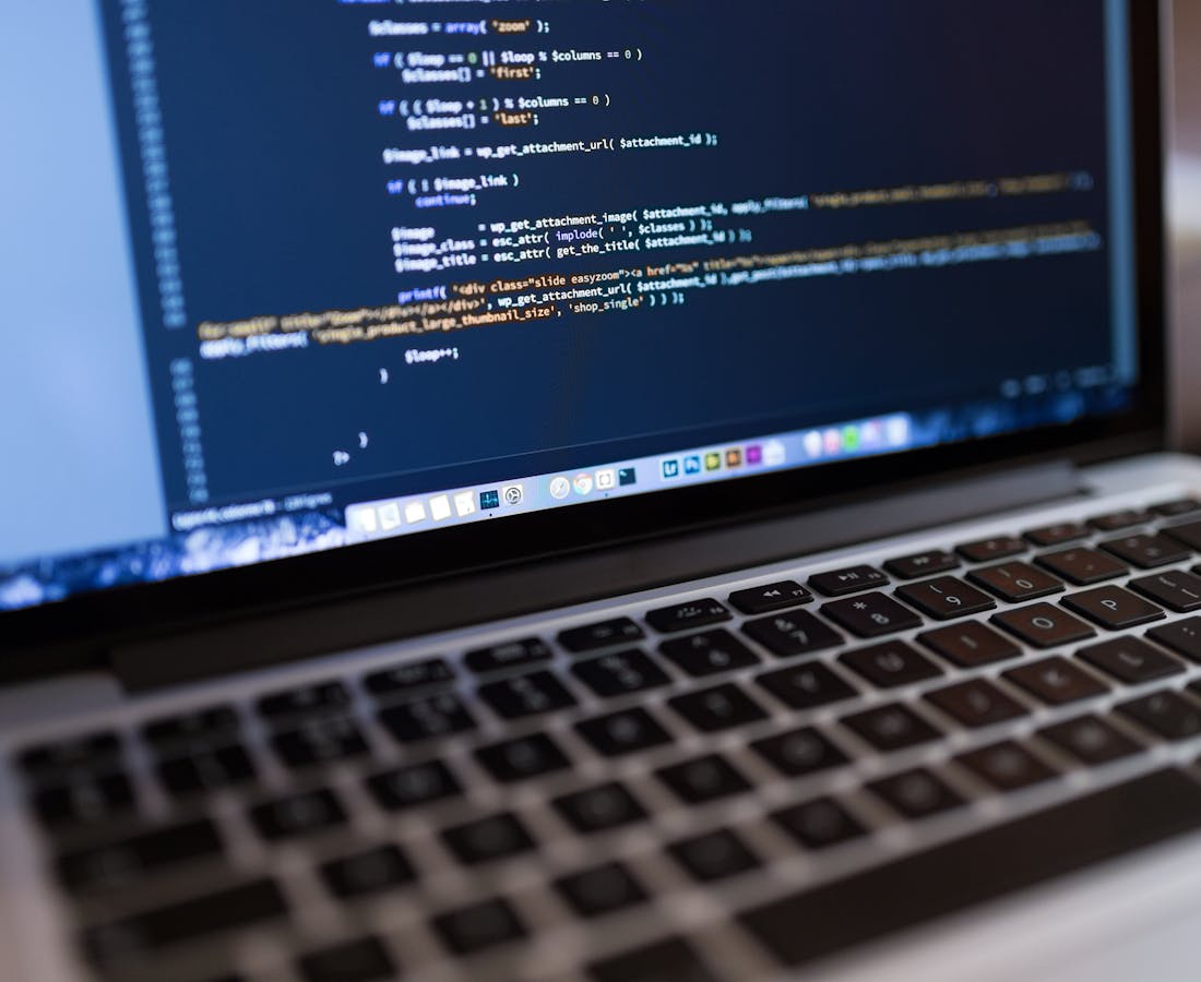 A WordPress site design open on a laptop